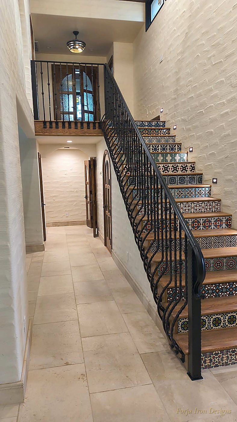 Interior Hand-Forged Iron Staircase with Talavera Tile Risers
