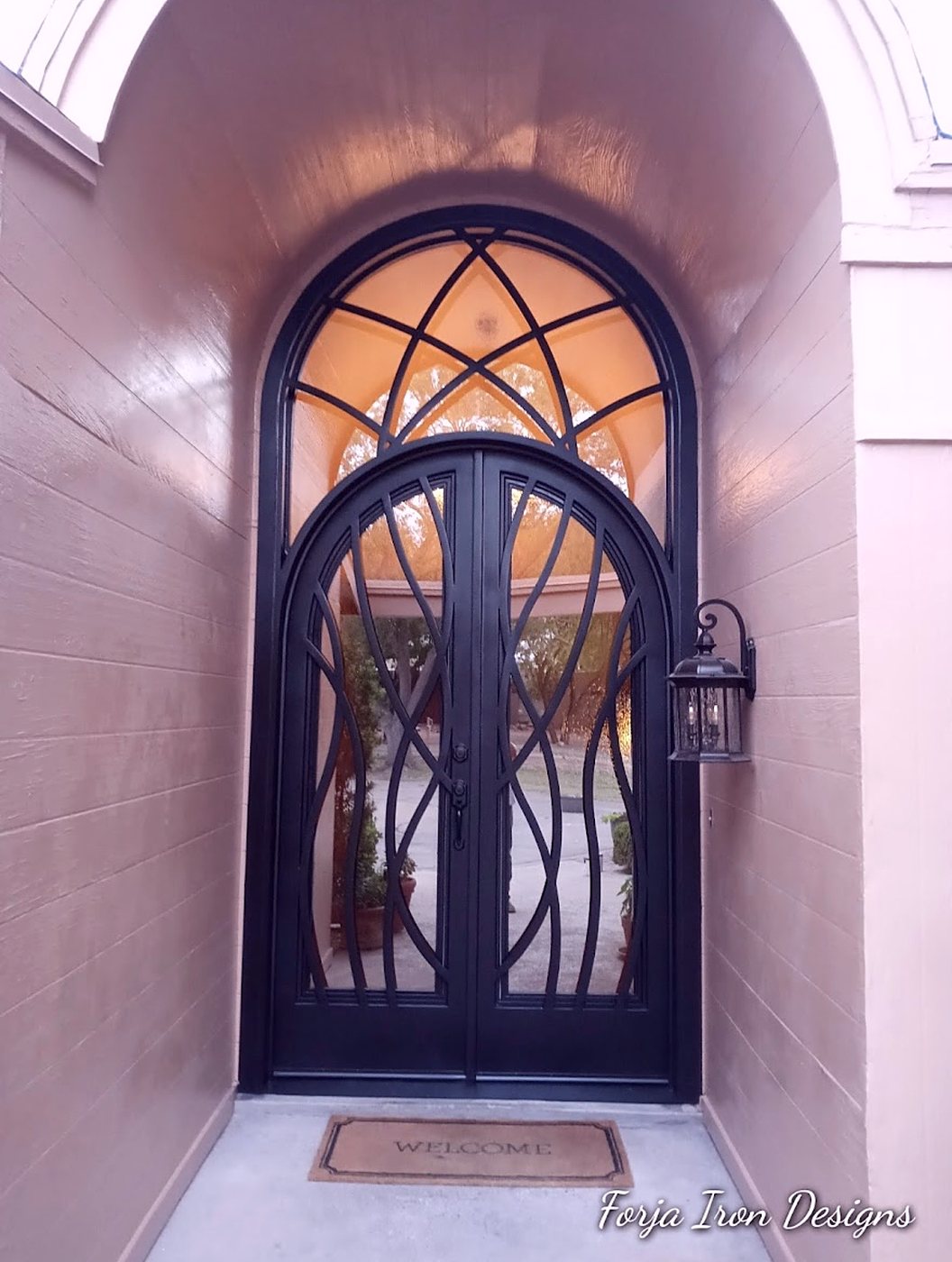 Modern Arched Iron Doors with Organic Scrollwork